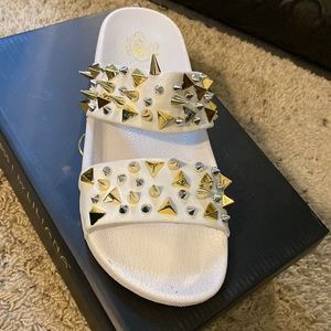 Miss L , white, gold spikes
